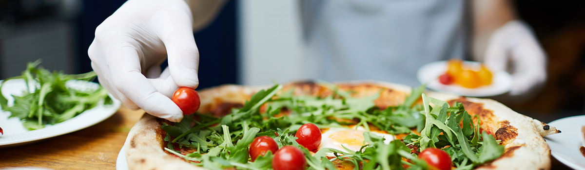 Decoration-for-pizza-384850 2 Hands of cook frying vegetables on pan